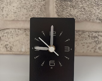 Special design metal desk clock for home and offices. It can be personalised and written with laser. New Year's gift clock. Modern design.