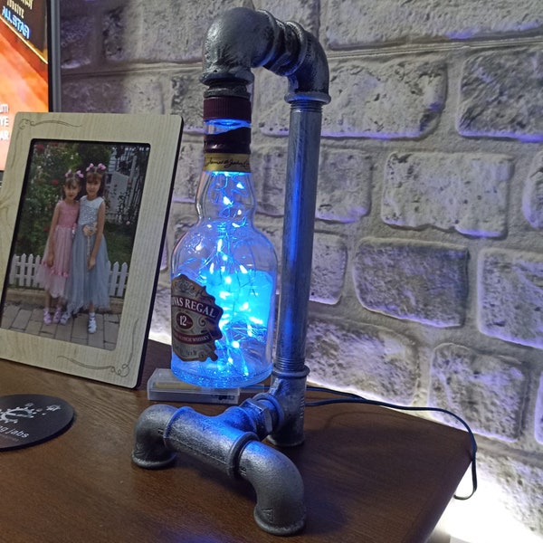 Whiskey bottle lamp made of water pipes. Fairy lamp with 1.5 volt battery,retro work, interesting and cute design, home gift, free shipping.