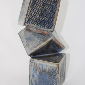 Three balancing cubes