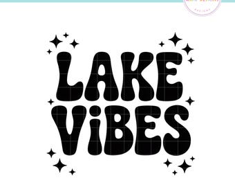 May include: Black and white graphic design with the words "LAKE VIBES" in a retro font, surrounded by starbursts. The design is on a white background, with a pink and blue border at the top and bottom.