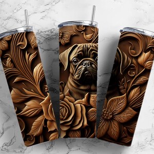 May include: A brown and black pug dog face with a floral design on a stainless steel tumbler. The floral design is carved into the metal and has a brown and gold color scheme.