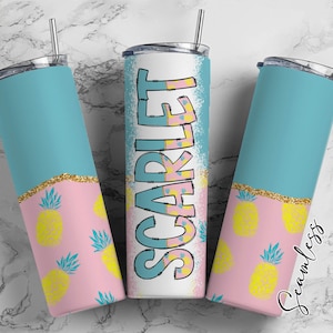 May include: Three stainless steel tumblers with a pink, blue, and white design. The tumblers feature a pineapple pattern and the word "SCARLET" in a colorful, stylized font. The tumblers are perfect for holding beverages.