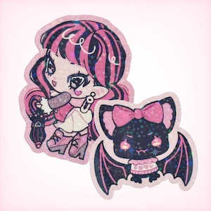 May include: Two holographic stickers featuring a stylized character with pink and black hair, wearing a pink jacket and skirt, and a small black bat with a pink bow, pink sweater, and wings. Both stickers have a star-patterned finish.