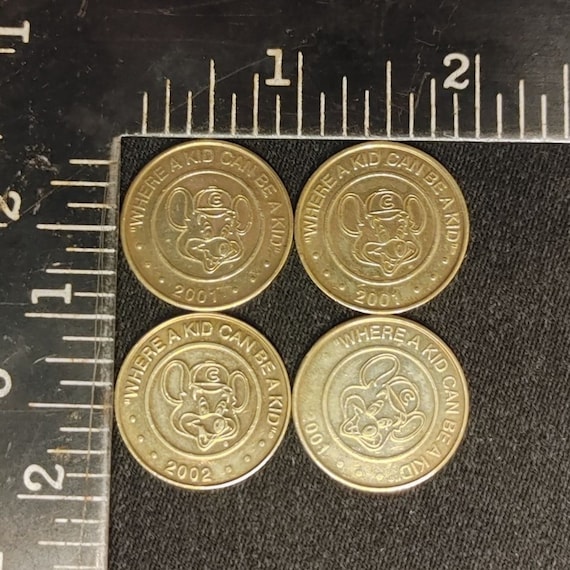 Chuck E Cheese Vintage 2001/2002 4pc Gold-tone Arcade Coin/tokens