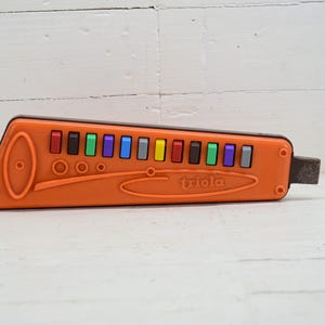 Triola - Musical toy Triola - Vintage triola - Child musical instrument - Musician keyboard triola - Blowing accordion - Made in GDR