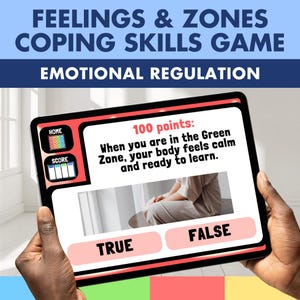 Può includere: Un tablet che mostra il "Feelings & Zones Coping Skills Game" con il testo "Emotional Regulation". Lo schermo mostra una domanda sulla Zona Verde, con le opzioni "Vero" e "Falso". Il tablet è tenuto da una persona.