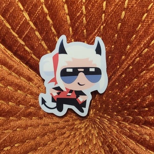 May include: A white and red cartoon character with horns and sunglasses. The character is wearing a black and red outfit and has a mischievous expression.
