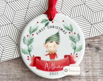 Personalised Baby Babies Baby’s First Christmas Boy Girl Newborn Holly Elf Pixie Design Ceramic Round Ornament Keepsake