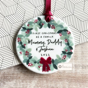 Personalised First Christmas as a family Mummy Daddy New Baby Botanical Greenery Wreath Design Ceramic or Acrylic Round Ornament Keepsake