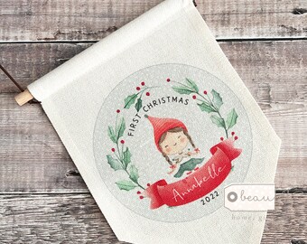 Personalised Baby Baby’s Babies First Christmas Elf Pixie Greenery Wreath Design Home Quote Linen Style Pennant Flag Room Decor