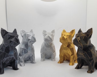 May include: Five geometric French bulldog figurines in different colors: black, silver, white, gold, and bronze.
