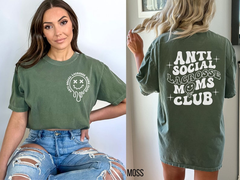 May include: Green t-shirt with a white graphic that says "Anti Social Lacrosse Moms Club" and a melting smiley face.