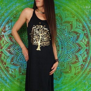 Sawi mid-length dress. Light and flowing asymmetrical dress. Tree of life print.