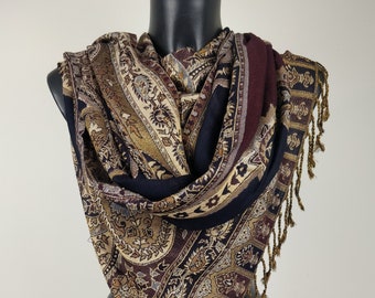 Pashmina Sakti in viscose. Blue, purple and brown paisley patterns.