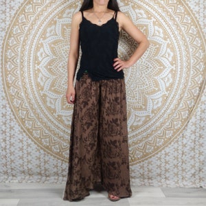 Korba pants in Indian silk. Loose skirt pants. Brown floral print.