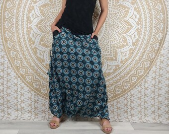 Pantalon Haria en coton. Sarouel / Pantalon-jupe ajustable avec poches. Imprimé géométrique turquois.