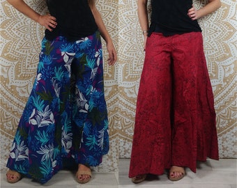 Pantalon femme Jebra en coton. Coupe ample et évasée, patte d'éléphant. Imprimé rouge et noir / fleuri bleu.