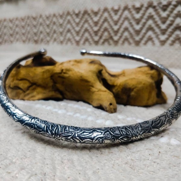 Round boho torc with flower in brass / silver plated brass.