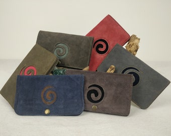 Leather tobacco pouch with snap button. Spiral pattern.