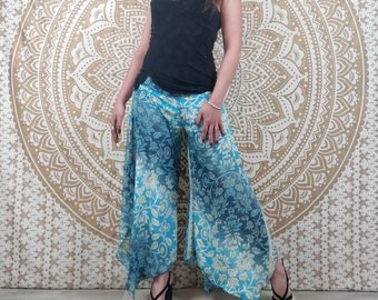 Lubbha women's pants in Indian silk. Flared cut, slit on the sides. Blue floral print.