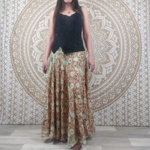 Nishana long skirt in Indian silk. Maxi flared boho skirt. Green, brown, and gold paisley print. Indian skirt. Elastic waist. Boho.