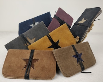 Leather tobacco pouch with lace closure. Star motif.