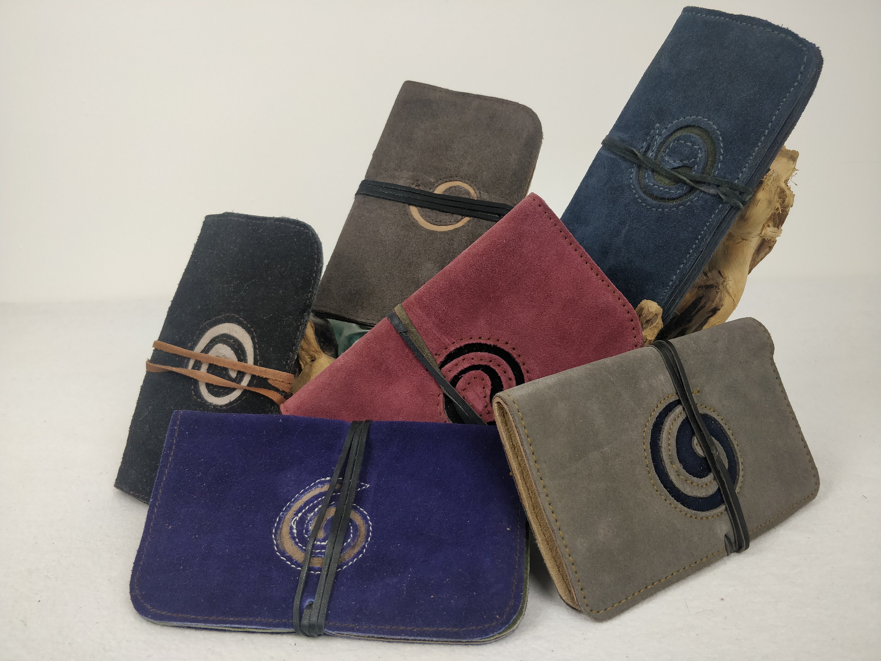 Leather tobacco pouch with lace closure. Spiral pattern.