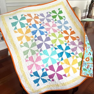 Baby Pinwheel Quilt, Handmade Baby Quilt, Boy or Girl Quilt with Jungle Animals Backing.  40in x48in. Ready to Ship.