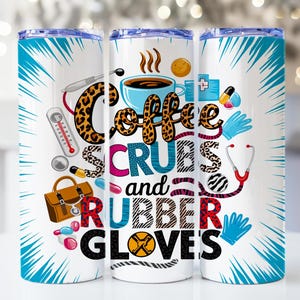 May include: Three white stainless steel tumblers with a blue and white design. The tumblers feature a coffee cup, a stethoscope, a pair of rubber gloves, and the text "Coffee, Scrubs and Rubber Gloves".