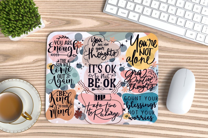 Boost your workspace vibes with our Mental Health and Motivational Mouse Pad PNG! Featuring an inspirational 'It's OK to Not Be OK' design, this boho-style sublimation file is perfect for creating a unique, uplifting mouse pad gift. Daily positivity!