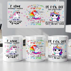 May include: Three white ceramic mugs with colorful unicorn illustrations and text. The mugs feature the phrases "I like sparkly things and the word "F*CK", "With a F*CK F*CK here... and a F*CK F*CK there... here a F*CK there a F*CK I don't give a F*CK F*CK", and "Is F*CK off an emotion? Because I feel that SH*T in my soul".