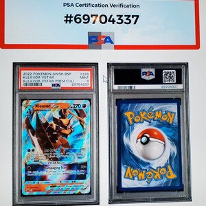 May include: PSA graded Pokemon trading card featuring Kleavor VSTAR from the Sword & Shield Brilliant Stars set. The card is in mint condition and has a grade of 9. The card is encased in a protective plastic case with a PSA label.