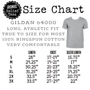 May include: Size chart for Gildan 64000 long athletic fit t-shirts. The chart shows measurements in inches for length, chest, and sleeve length for sizes S, M, L, XL, 2X, and 3X.