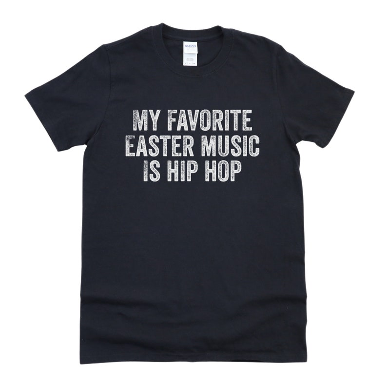 May include: Black t-shirt with white text that reads "My favorite Easter music is hip hop".