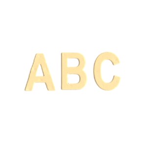 Gelbe Gestanzte Buchstaben