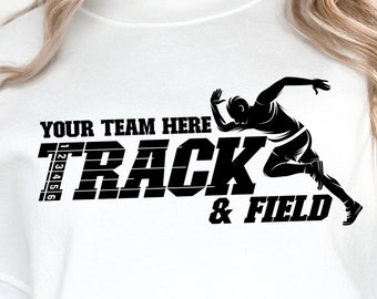 May include: White sweatshirt with the text "YOUR TEAM HERE TRACK & FIELD" in black. A black silhouette of a runner is on the right side of the text. The sweatshirt is worn with blue jeans.
