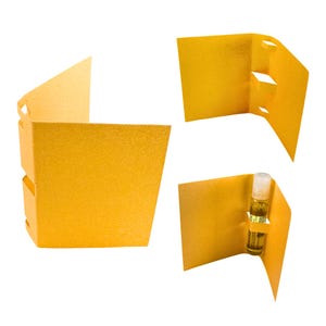 May include: A bright yellow, textured paper card holder designed to fold around a small item. The card features two die-cut slots on one side, allowing a small cylindrical glass vial with a white cap to be securely held in place within the fold.