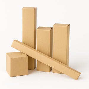 May include: An assortment of unopened brown cardboard boxes in various shapes and sizes. There are rectangular and square boxes, with a long, flat box angled across the others. The boxes are set against a white backdrop.