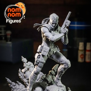 Figurine Solid Snake – Metal Gear Solid | Impression 3D à peindre | Fan Art MGS | Diorama Action Infiltration | Statue non officiel