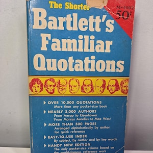 May include: A vintage paperback book titled "The Shorter Bartlett's Familiar Quotations." The cover is blue with white and yellow text, featuring portraits of historical figures. The book includes over 10,000 quotations and nearly 2,000 authors.