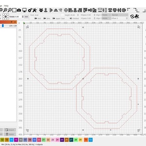May include: A computer screen displaying a design program with two octagonal shapes outlined in red on a grid background.