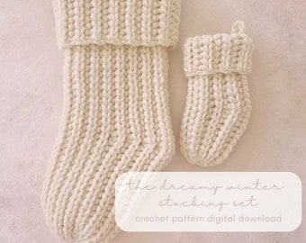 May include: A set of two crocheted stockings in a cream color. The larger stocking is taller and wider than the smaller stocking. The text "the dreamy winter stocking set crochet pattern digital download" is printed below the stockings.