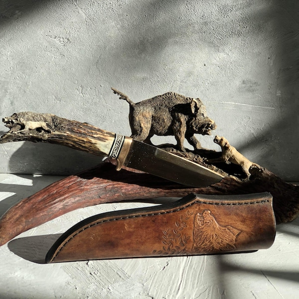 Wild boar knife sculpture