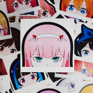 May include: A collection of anime-style stickers featuring various characters. The central sticker showcases a pink-haired character with teal eyes and a white headband with red accents. Surrounding stickers display other anime character eyes.