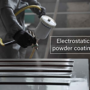 May include: A worker wearing a protective suit uses an electrostatic powder coating gun to apply a layer of paint to a metal surface. The text "Electrostatic powder coating" is visible in the image.