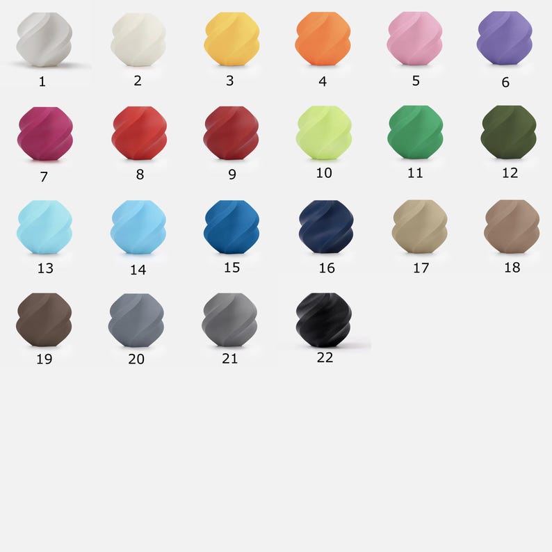 May include: A collection of twenty-two spherical objects, each with a unique color and a spiral design. Colors range from white to black, including yellow, orange, pink, purple, red, green, blue, and brown. Each sphere is numbered from 1 to 22.