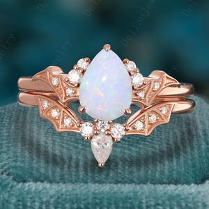 Unique Pear Cut Opal Engagement Ring Set Rose Gold Bridal Ring Art Deco Opal Wedding Ring Set Vampire Bat Moissanite Ring Anniversary Gift