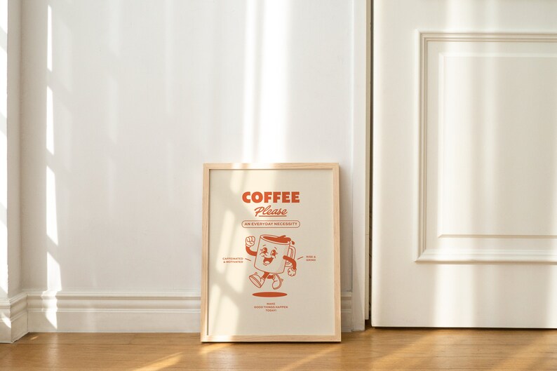 May include: A framed print with a cartoon coffee cup illustration and the text "COFFEE Please, An Everyday Necessity".