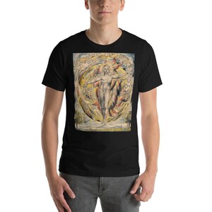 May include: A black t-shirt with a colorful image of a man standing with outstretched arms. The image is surrounded by swirling colors and shapes.