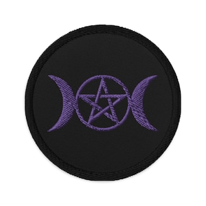 May include: Purple embroidered triple moon and pentagram symbol on a black circular patch.
